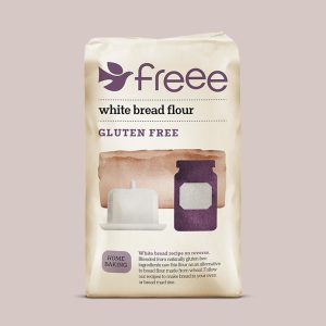 Gluten-free white bread flour bag for baking, with recipe tips on the back.